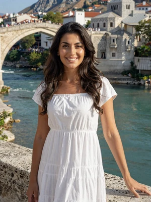 Lejla, 28-year-old Bosnian woman from Mostar with dark wavy hair near historic stone bridge